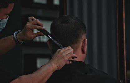 5 Men's Haircuts With Short Sides and a Long Top